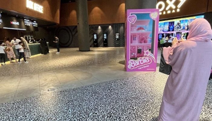 Women in pink watch 'Barbie' in Dubai, Saudi Arabia