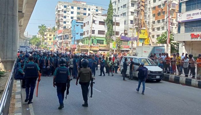 Police charge baton, tear shell to disperse RMG workers
