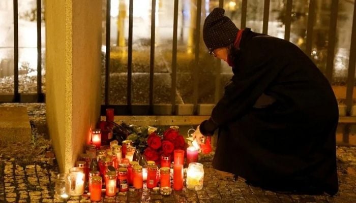Day of mourning after gunman kills 14 in Prague