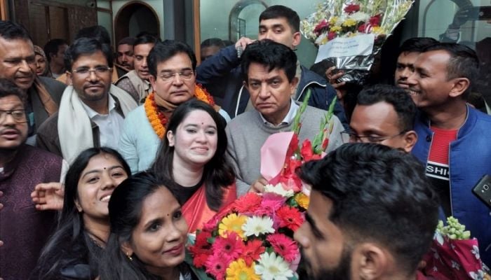 Crowds throng to greet A.K. Azad