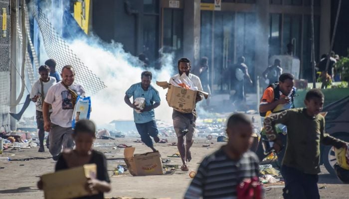 Papua New Guinea vows crackdown after 15 killed in riots