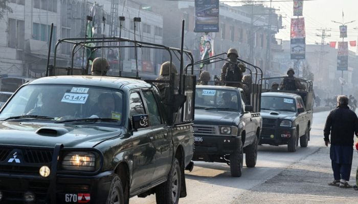 22 killed, 37 wounded in twin blasts on eve of Pakistan election