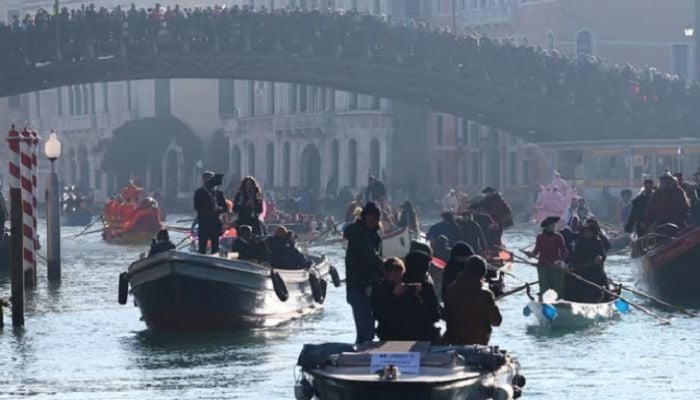 Venice revellers enjoy last carnival before fee for day-trippers