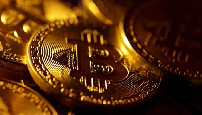 Bitcoin briefly rises to record high over $70,000