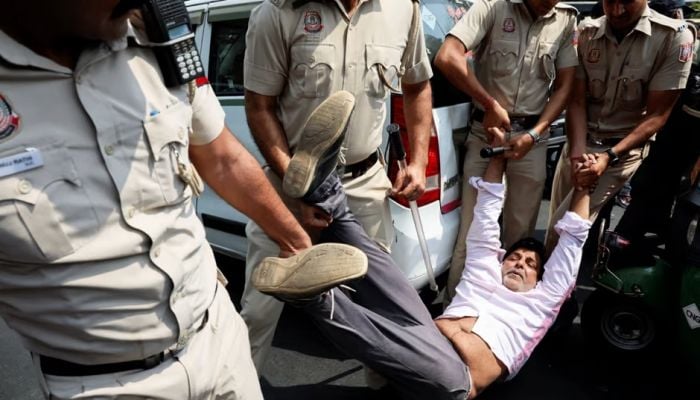 India opposition members detained after arrest of Delhi leader Kejriwal