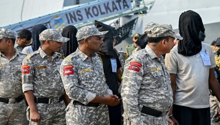 35 Somalis arrive in India to face trial over ship hijacking