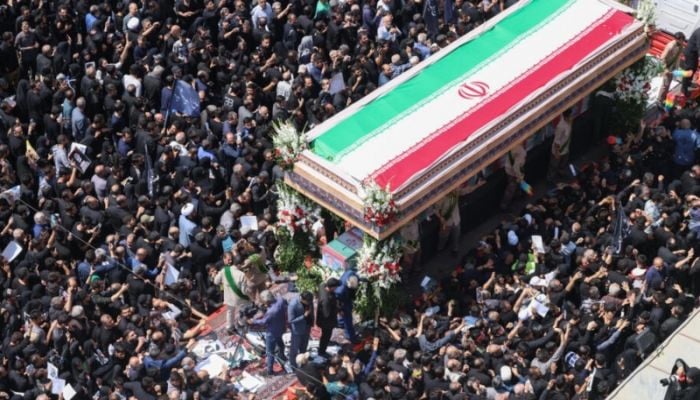 Thousands bid farewell to Iran's Raisi ahead of burial