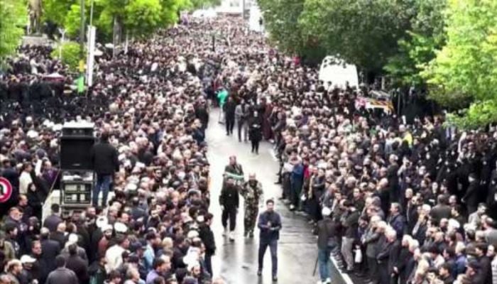 Thousands mourn Raisi in funeral procession