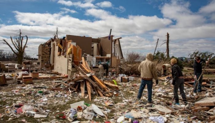 Death toll climbs to 21 after tornadoes, storms buffet US