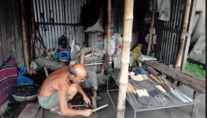 Blacksmiths passing busy time in Netrakona ahead of Eid-ul-Azha