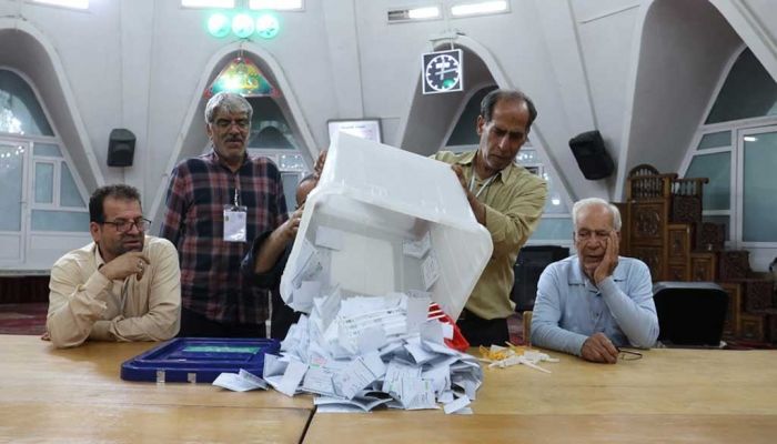 Khamenei protege, sole moderate neck and neck in Iran presidential race