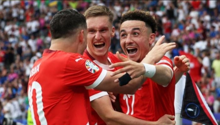 Switzerland stun holders Italy to reach Euro 2024 quarters