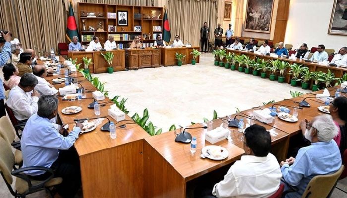 Prime Minister sits with 14-party alliance