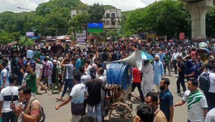Students gather to block roads in the capital