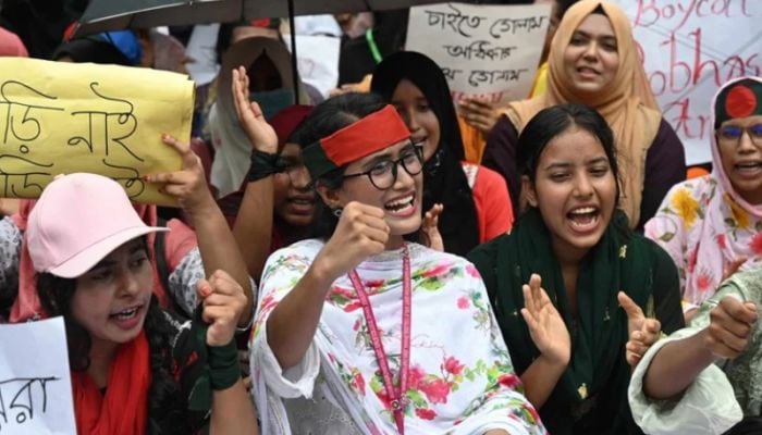 Protesters gather at Raju sculpture