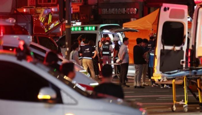 Car drives into crowd outside Seoul city hall, six dead