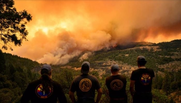 Evacuations, destruction as California's largest fire of year rages