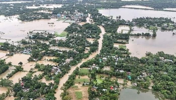 At least 13 dead in flood