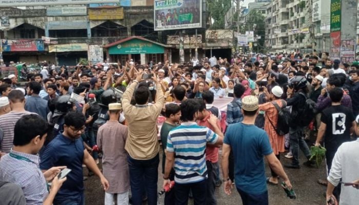 Traffic halts as students gather at the Science Lab intersection