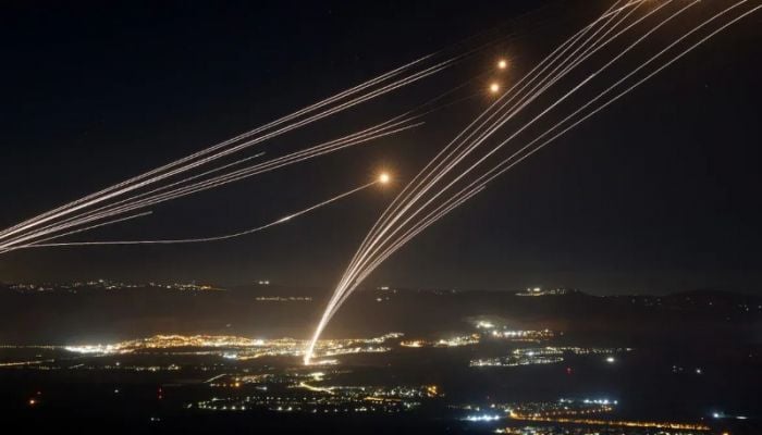 Hezbollah launches dozens of rockets at israel, spurs fears of regional war
