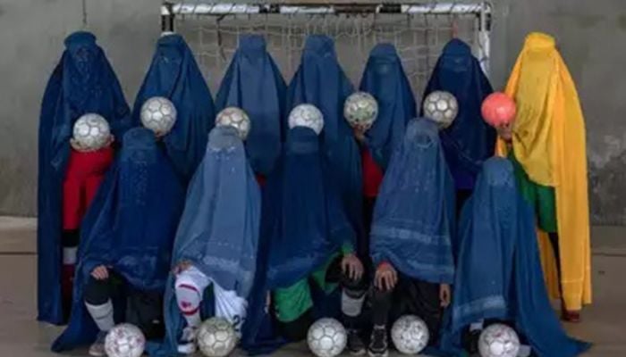 Barred from sport, Afghan women seek relief in secretive exercise