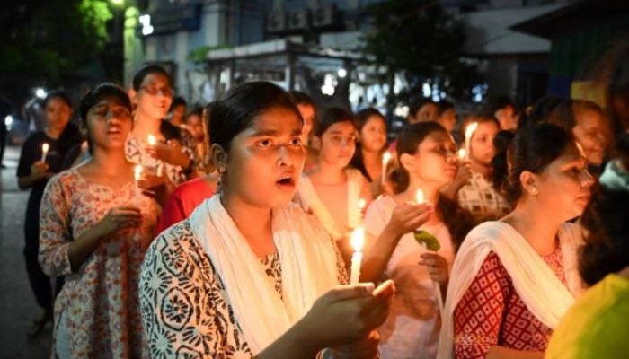 Indians demand justice in candlelight march for murdered doctor