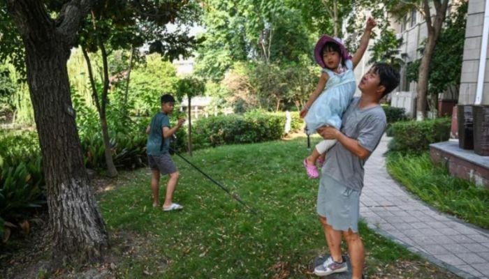 China's 'full-time dads' challenge patriarchal norms
