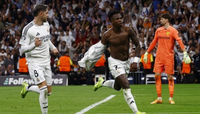 Vinicius hattrick helps Real Madrid roar back and thrash Dortmund