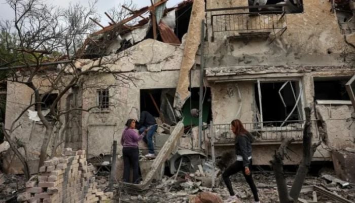 Hezbollah fires rocket barrages into Israel after deadly Beirut strikes