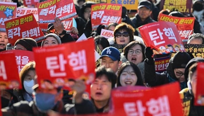 South Korean president faces second impeachment vote as thousands rally