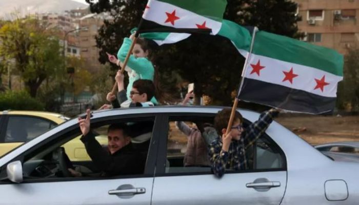 In Damascus, life resumes without Assad