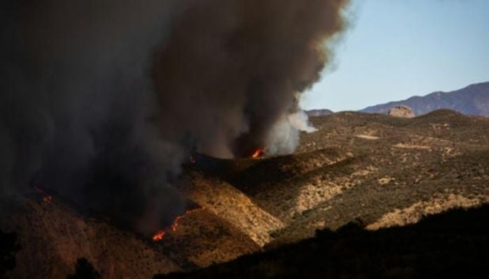 Mass evacuations after explosive new fire erupts near Los Angeles
