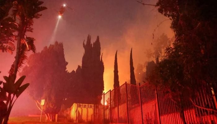 Hollywood Hills blaze rapidly expanding, fire chief says