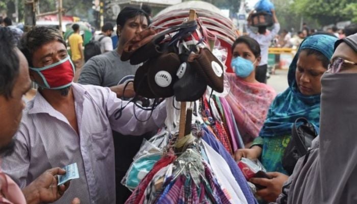 DoE urges city dwellers to wear face mask