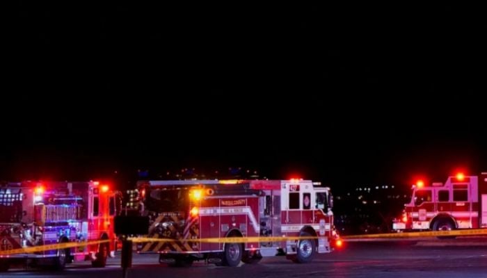 US jet carrying 60 passengers collides with helicopter, crashes into river
