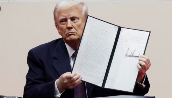 What executive orders did Trump sign on day one?