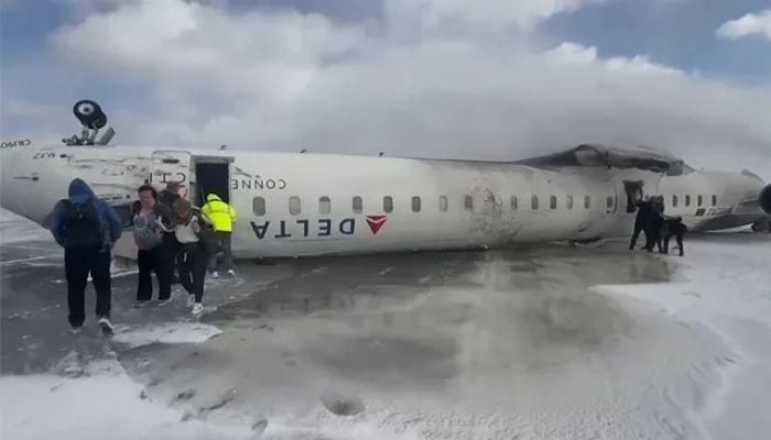 Delta plane flips upside down in Toronto crash, at least 17 injured