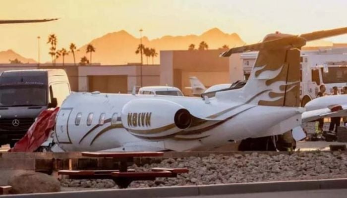 At least one dead as business jets collide at US airport