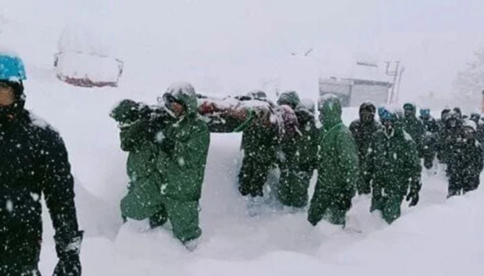 Rescuers search for 22 workers after avalanche in India