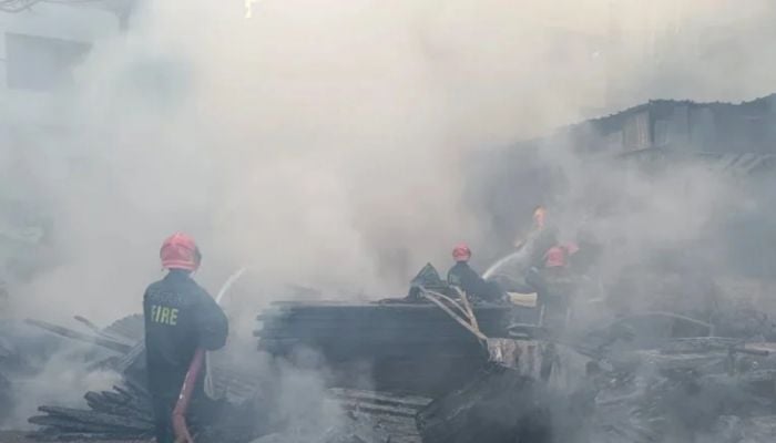 Fire breaks out at garage in Dhaka's Rampura