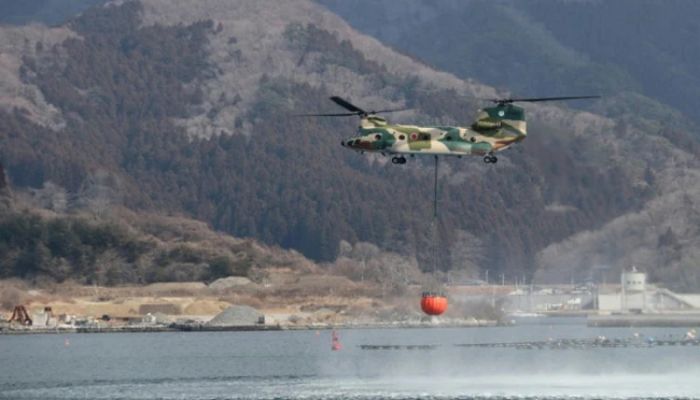 Rain offers relief as Japan battles worst wildfire in 50 years
