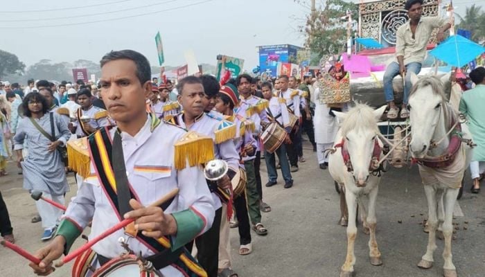 Thousands celebrate Eid with colourful rally in Dhaka 