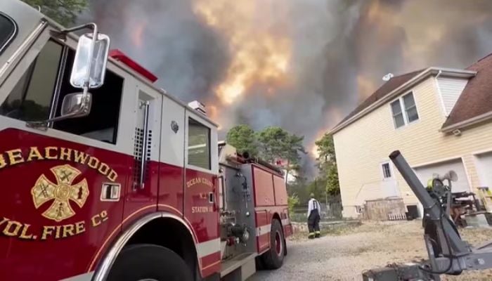 Thousands evacuate as fire spreads in US state of New Jersey