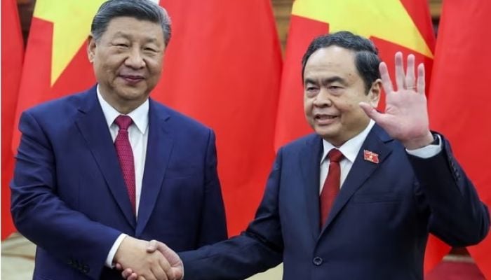 China’s Xi Jinping is in Vietnam to figure out how to ‘screw’ the US, says Trump