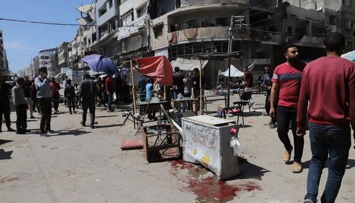 Israeli strikes on Gaza restaurant and market kill 33