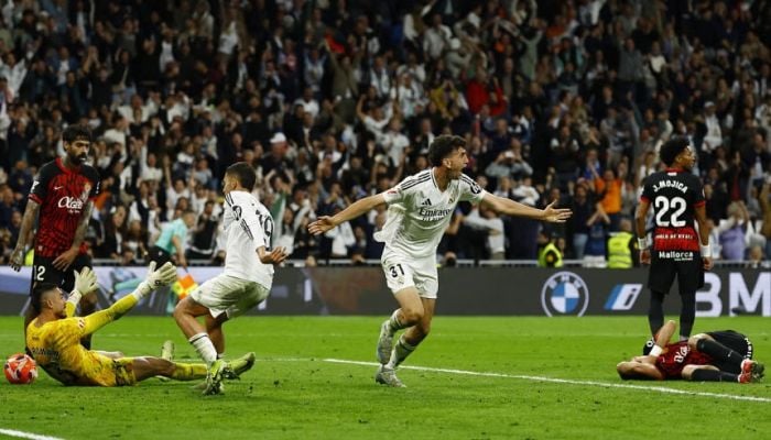 Real Madrid delay Barca celebrations with late win over Mallorca