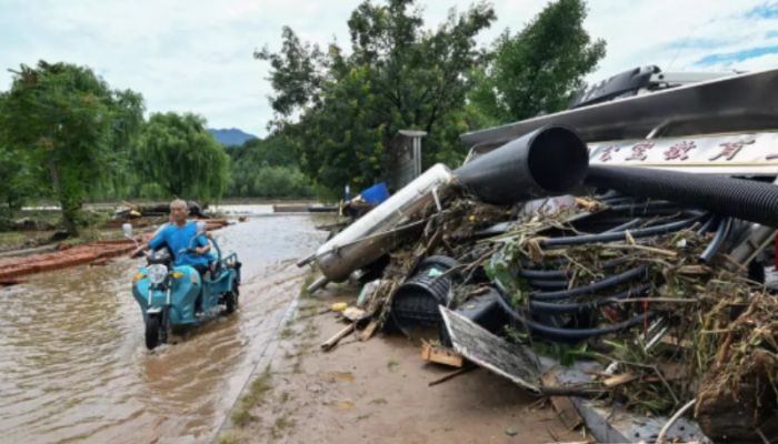 Beijing officials admit 'gaps' in readiness after rains kill 44