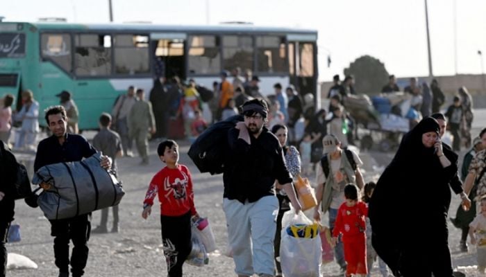 Nearly 450,000 Afghans left Iran since June 1: IOM