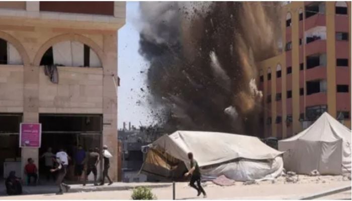 Palestinians flee Gaza City districts as Israel says first stages of assault have begun