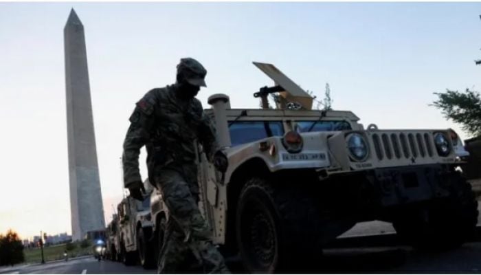 National Guard troops appear in Washington DC as mayor rejects 'authoritarian push'